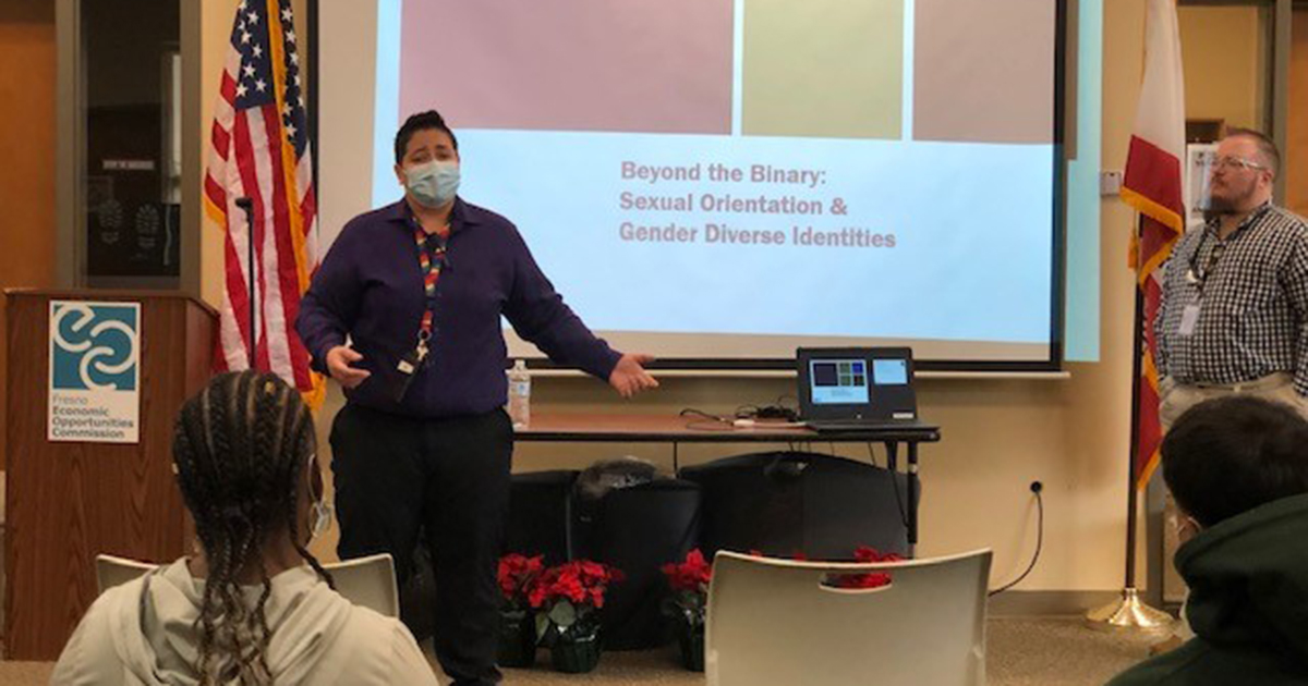 LGBTQ+ Resource Center Manager, Jennifer Cruz, and Community Outreach Educator, Jess Fitzpatrick presenting at LCC